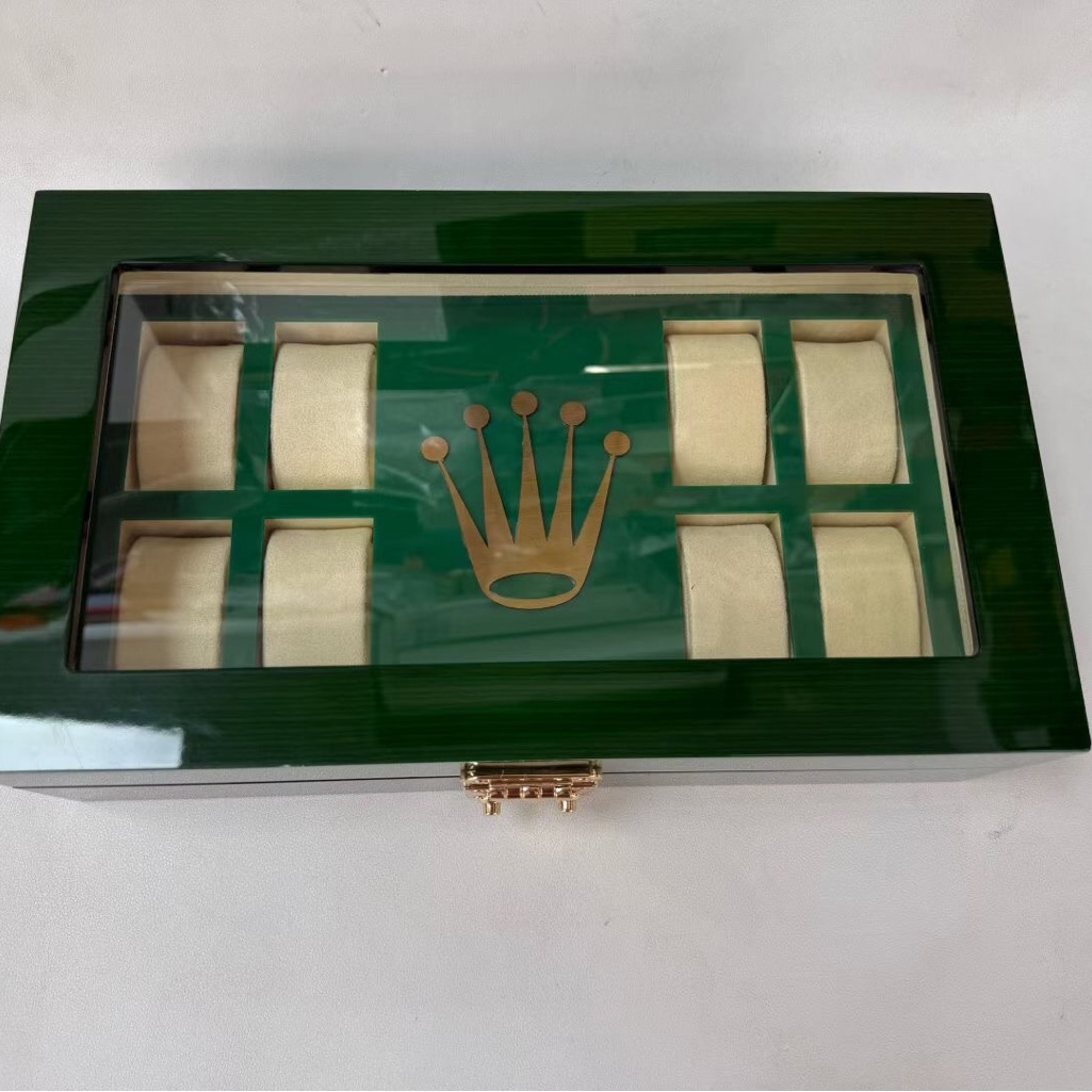 Green Watch Display Case With Gold Crown Emblem